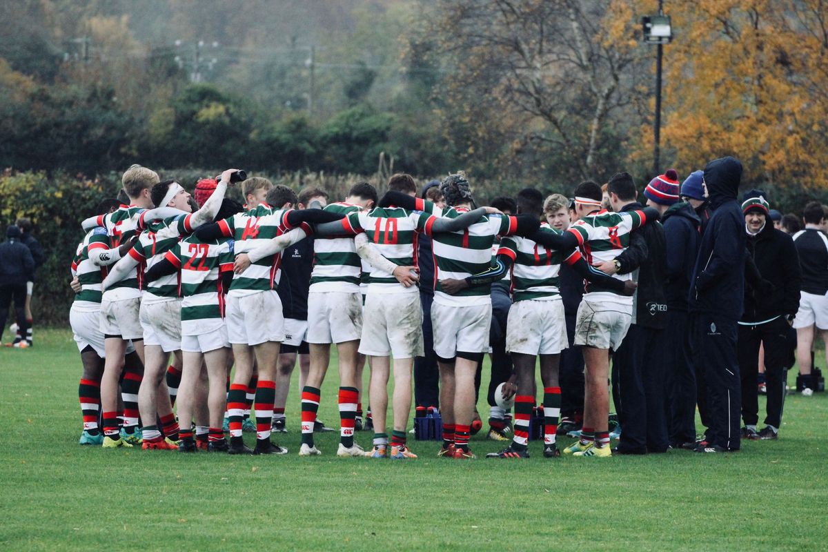Club team huddled together before a match